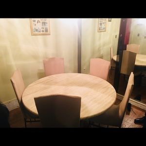Round wood dining room table.. seats 5